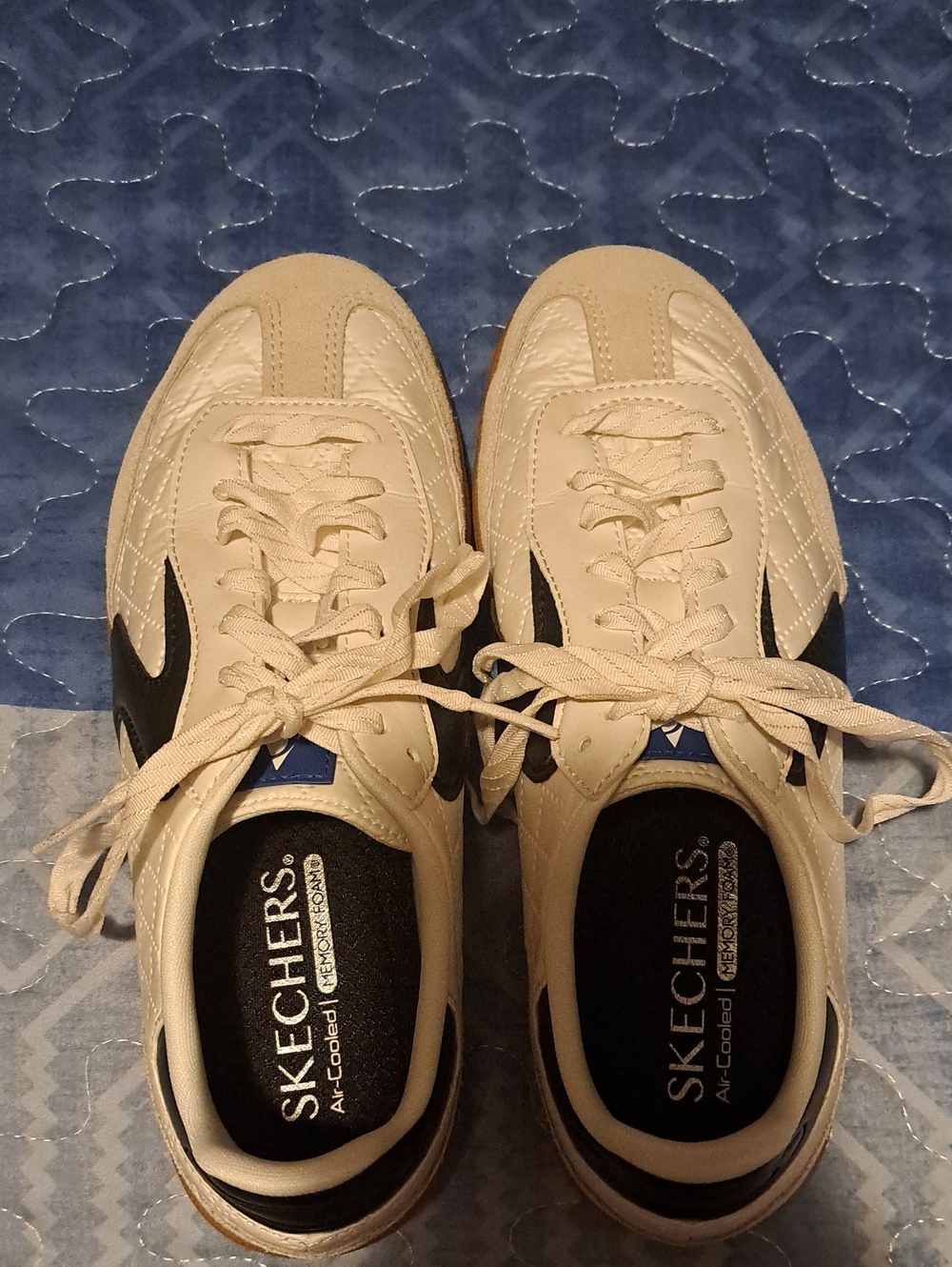 Skechers Women’s Cream Athletic Sneakers with Black and Blue Accents